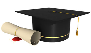 Graduation diploma and cap